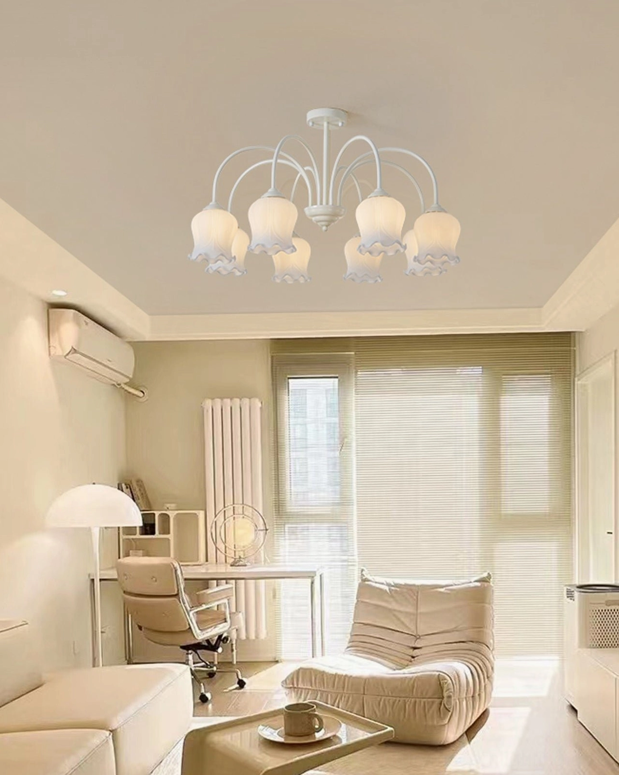 Frosted glass lily of the valley chandelier installed in bedroom creating soft romantic ambient glow