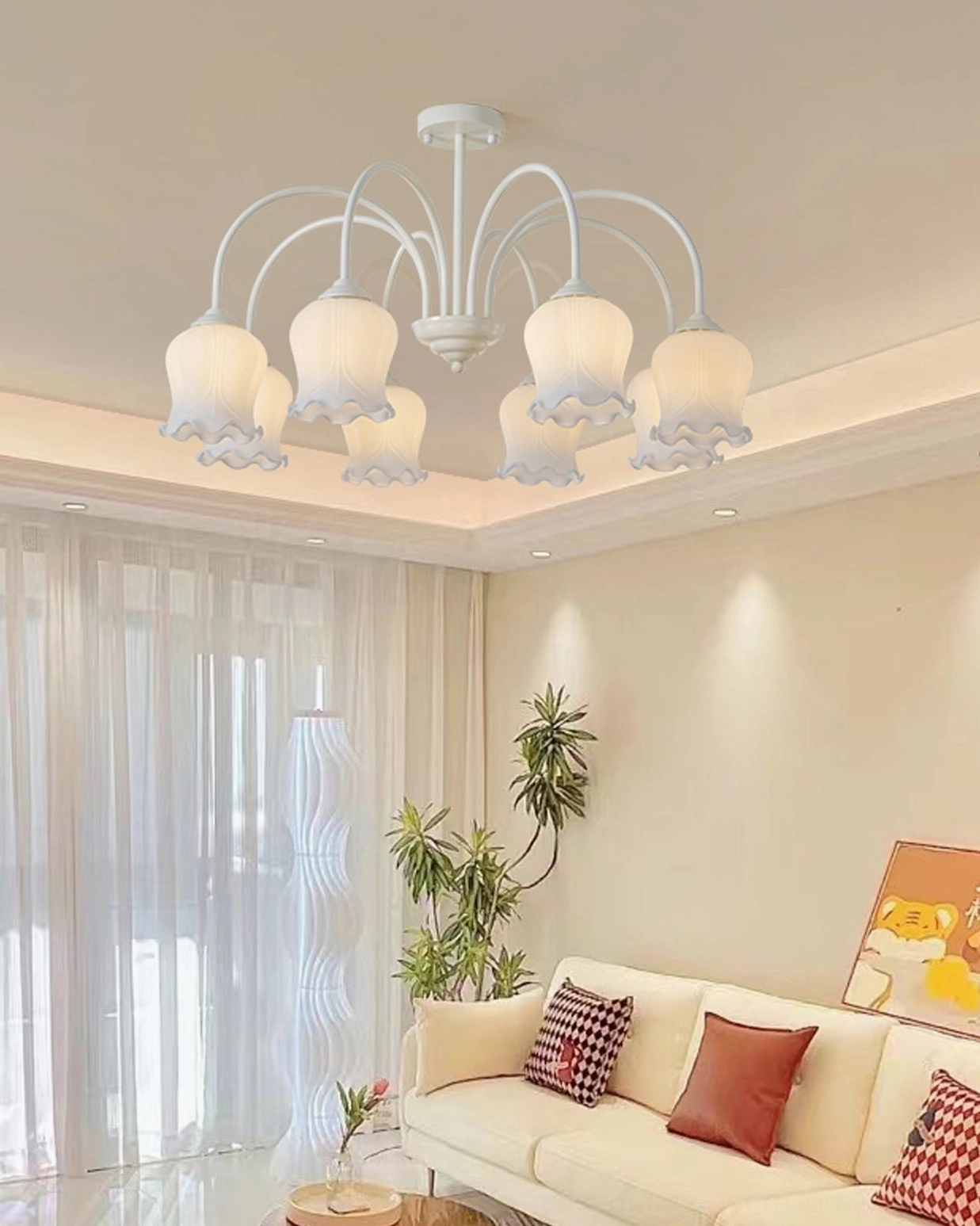 Lily chandelier multi-head frosted shade arrangement creating botanical floral pendant light effect