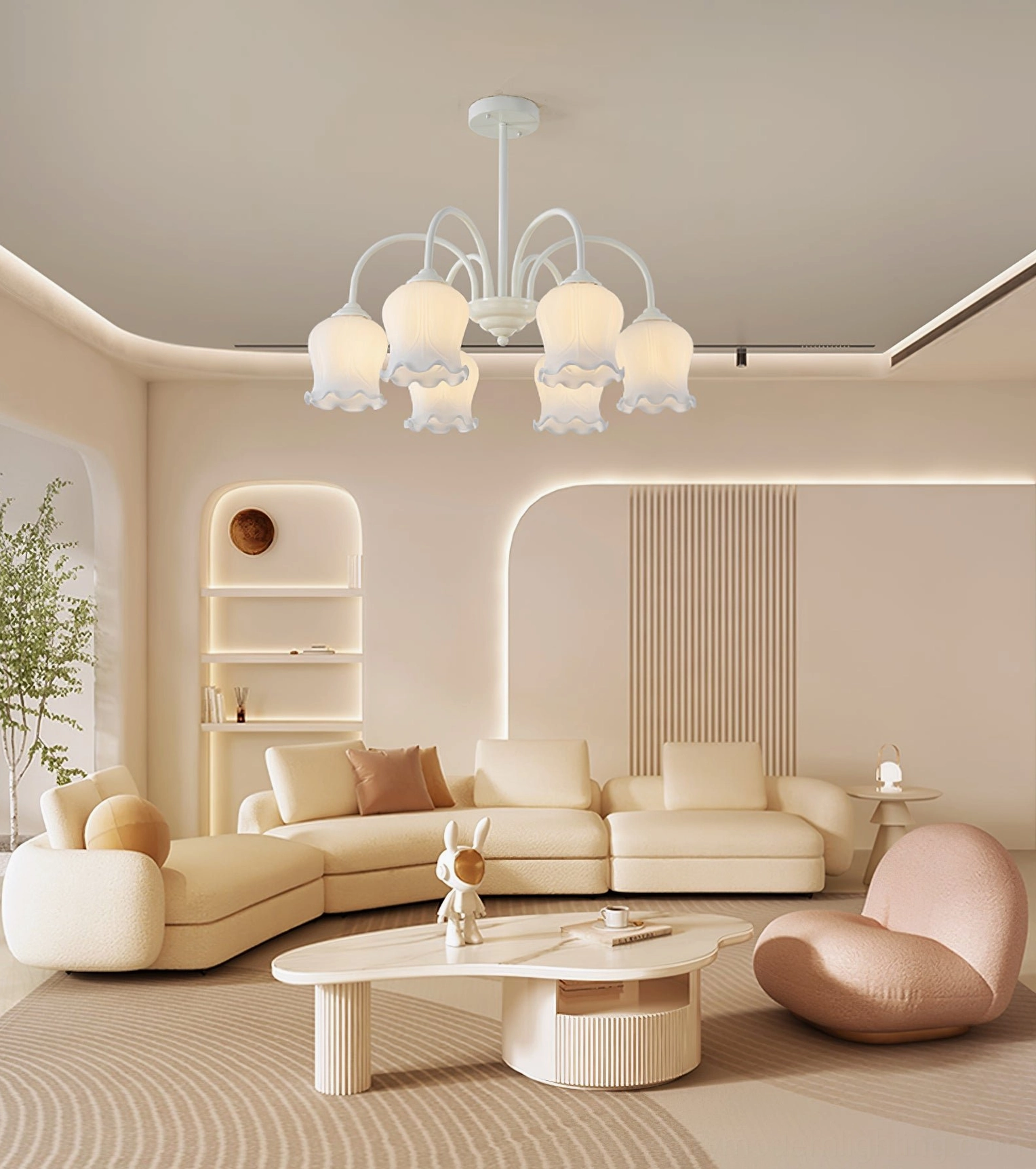 Lily chandelier installed in modern cream interior with sofa and coffee table showing coordinated warm tones