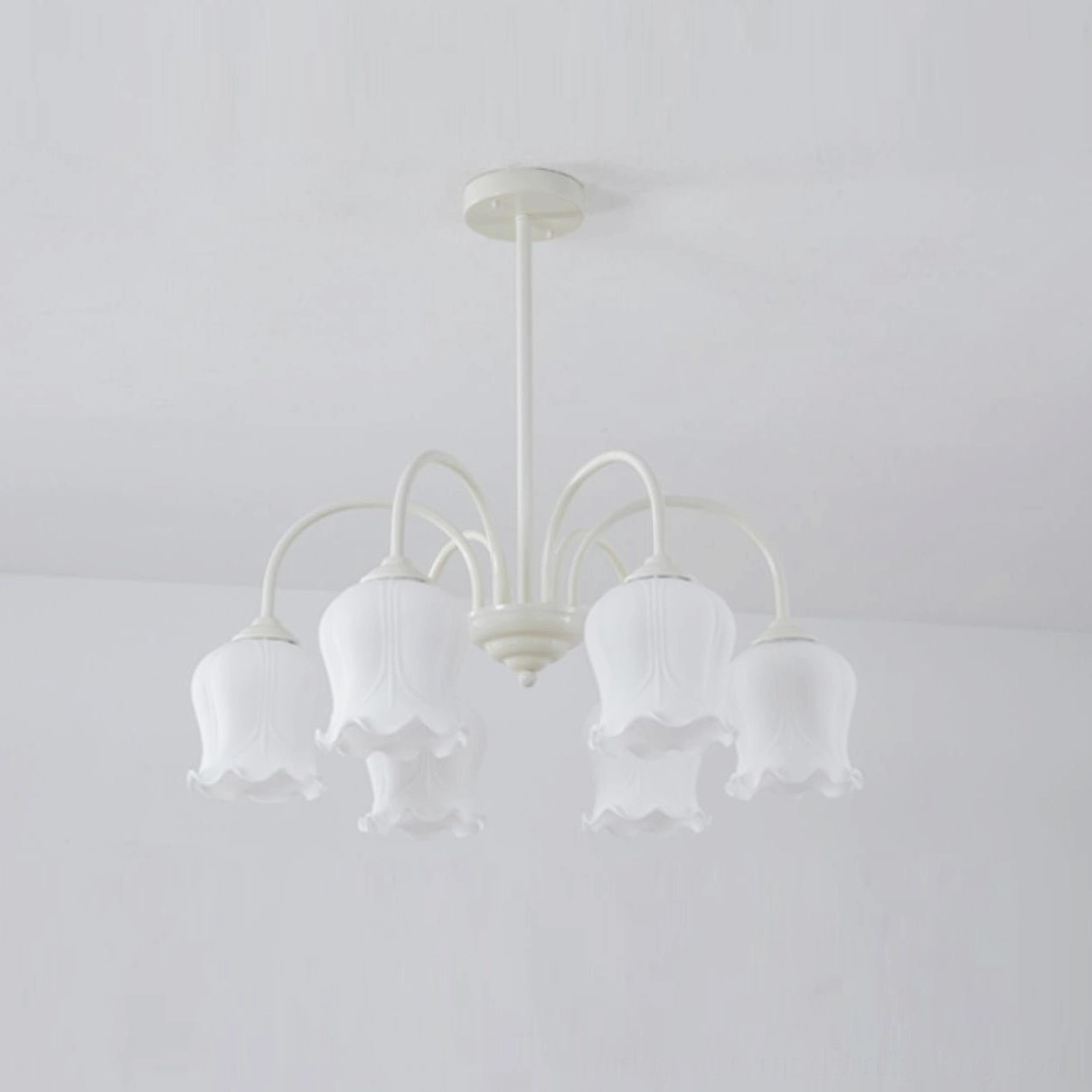 Frosted lily chandelier overhead perspective showing white metal frame and diffused light pattern