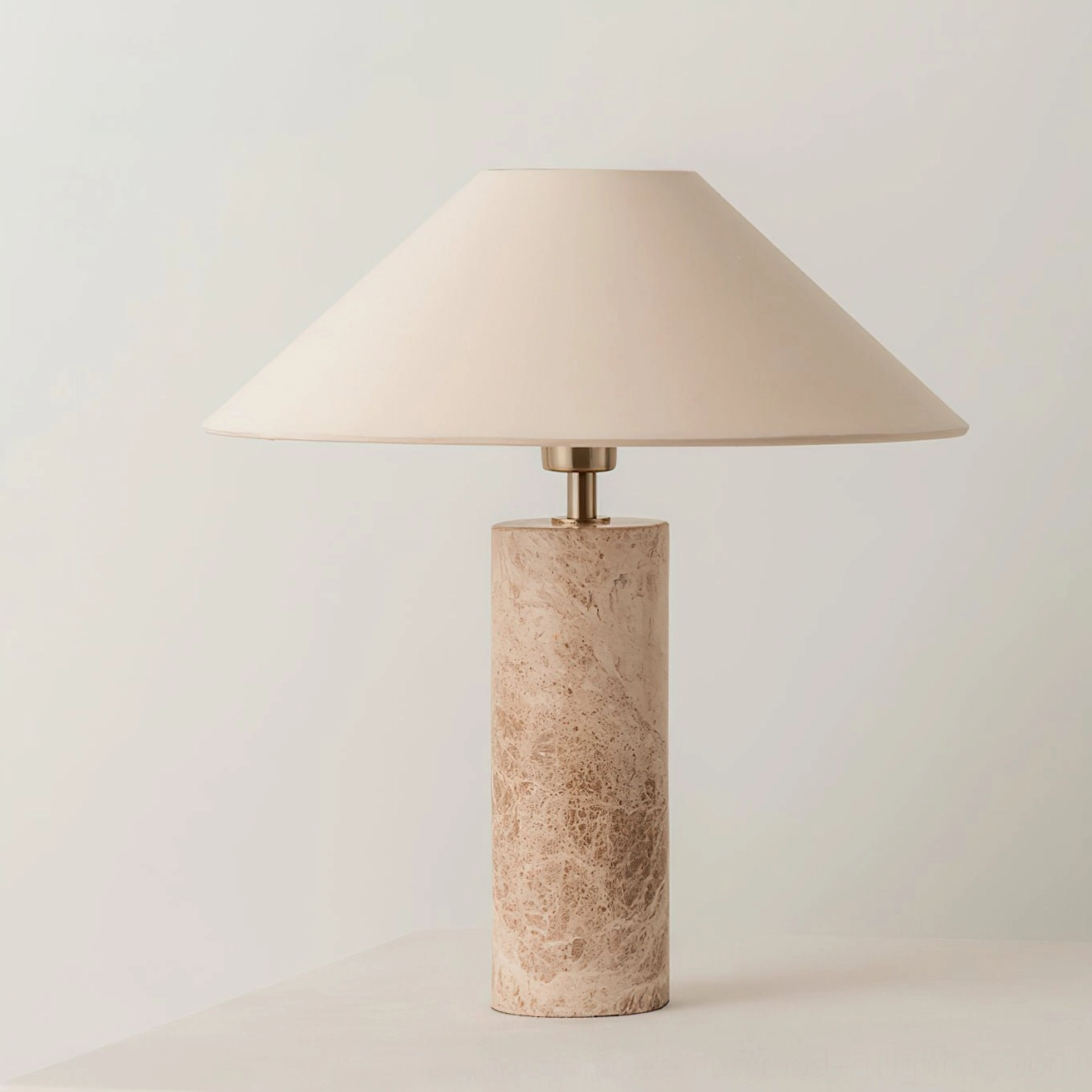 Limoges marble table lamp front view with light beige base on white studio background