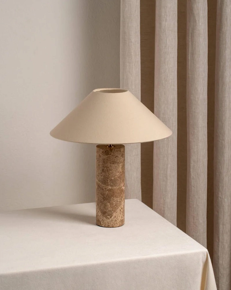 Limoges marble table lamp unlit three-quarter view dark brown stone base indoor curtain setting