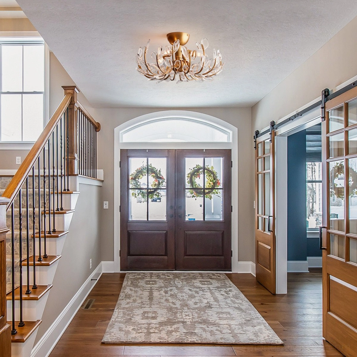 Lindsay floral light fixture in residential entryway hallway, elevating classic farmhouse style entry decor with elegant illumination