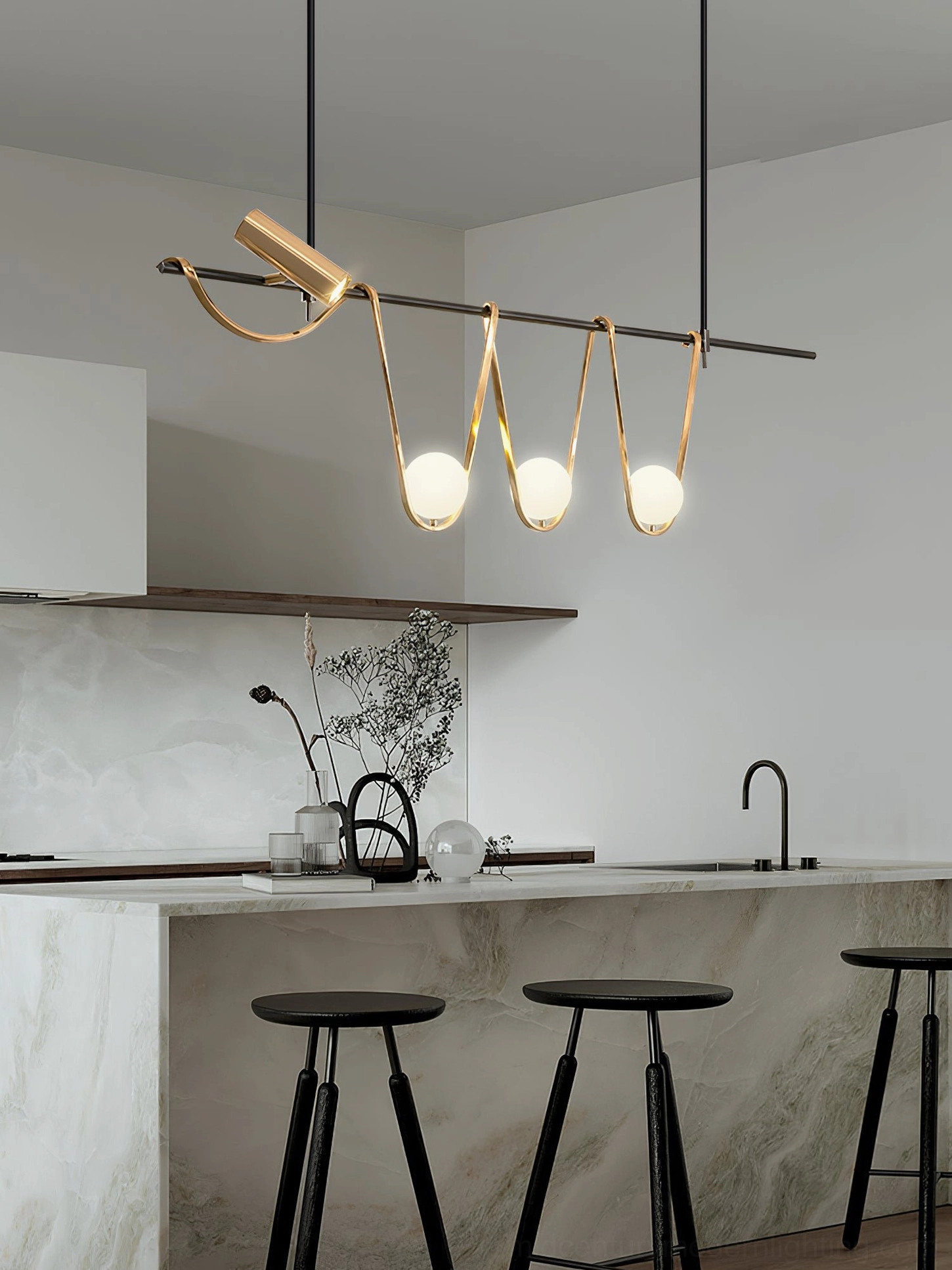 Linear chandelier over contemporary marble kitchen island - minimalist pendant lighting for modern countertops