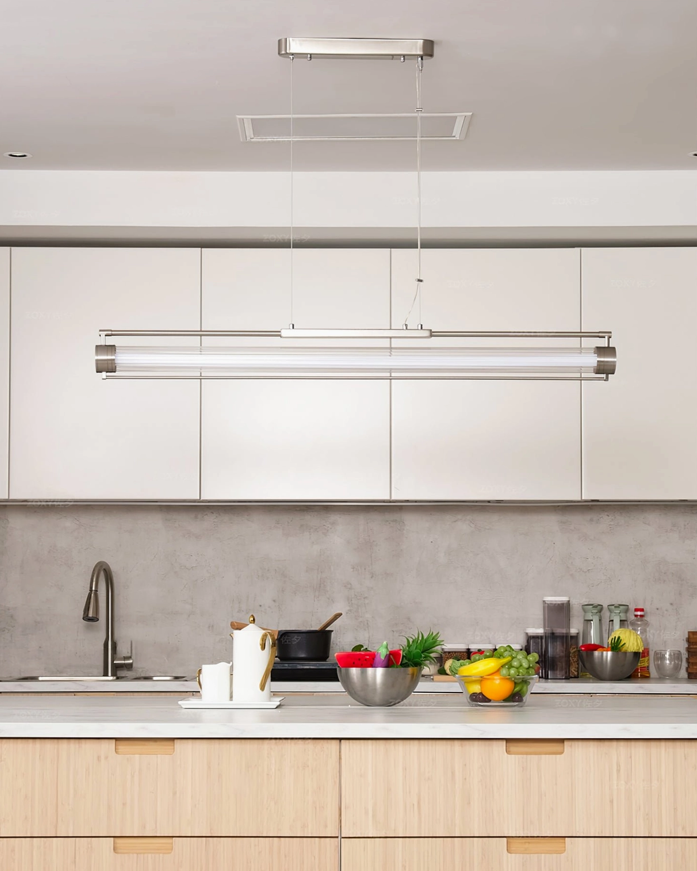 Modern kitchen with installed Lirna linear LED pendant chandelier above workspace
