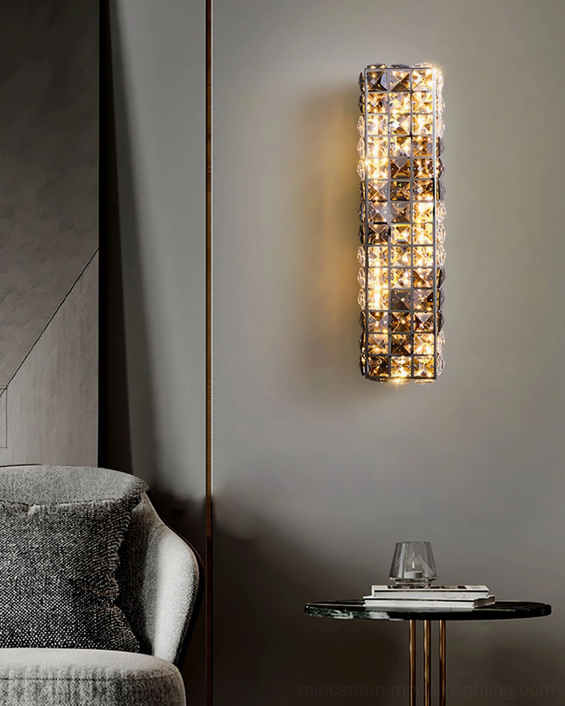 Crystal wall sconce in modern living room corner with grey sofa and contemporary furnishings
