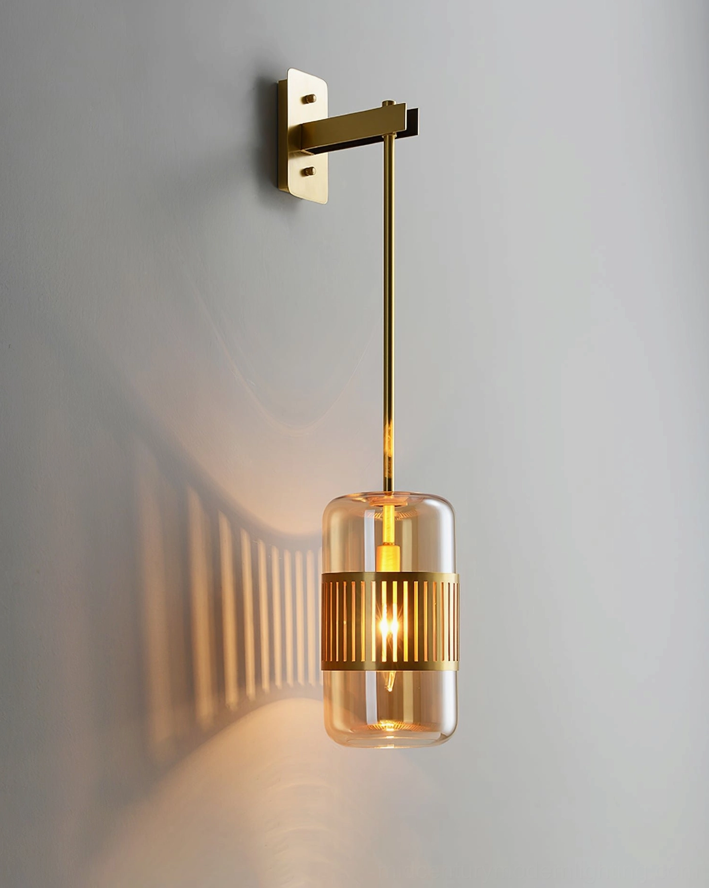 Lizak wall lamp mounted near artwork and gallery setting, complementary sculptural lighting accent piece