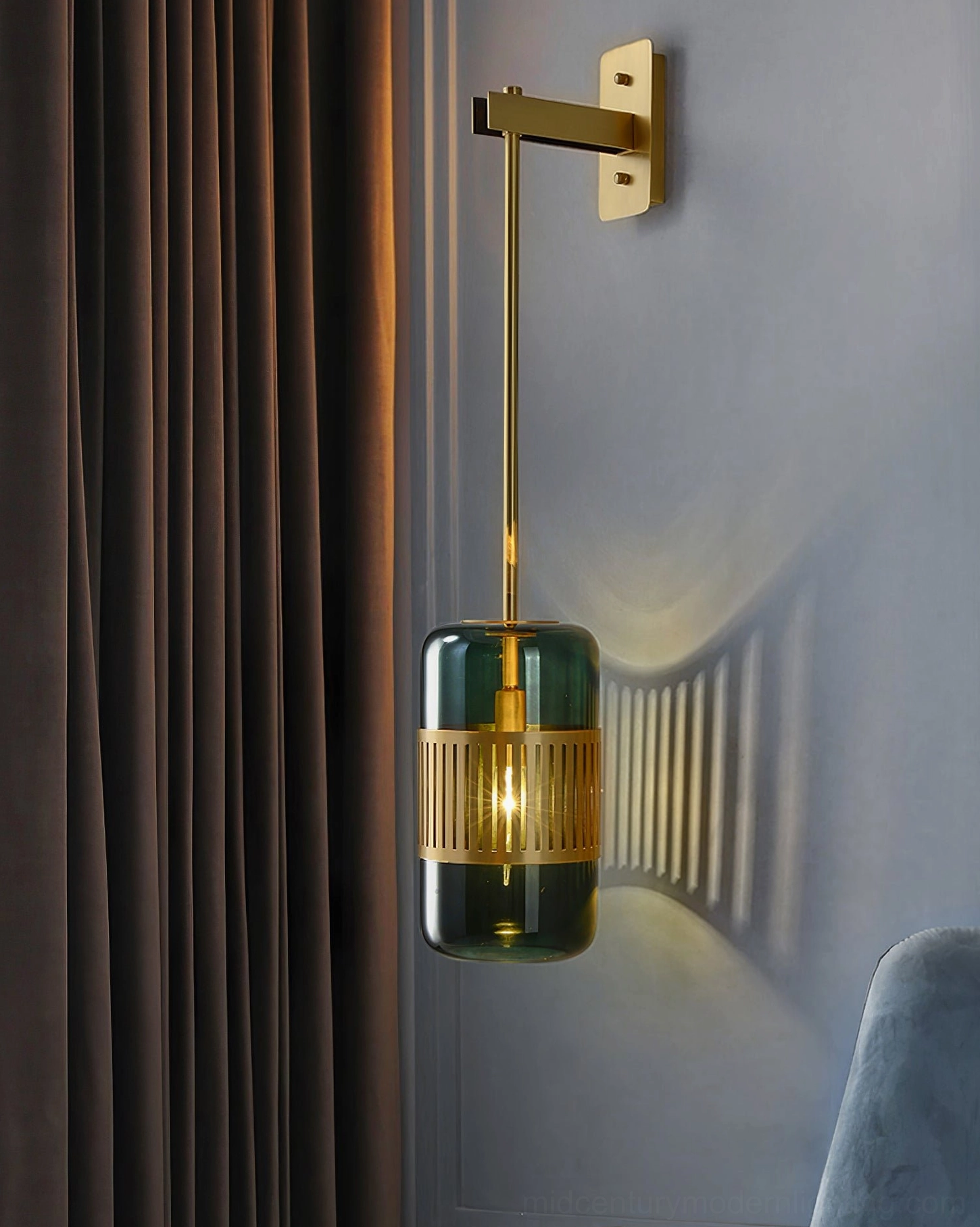 Lizak modern wall sconce in minimalist home setting, demonstrating clean lines and sophisticated brass hardware design