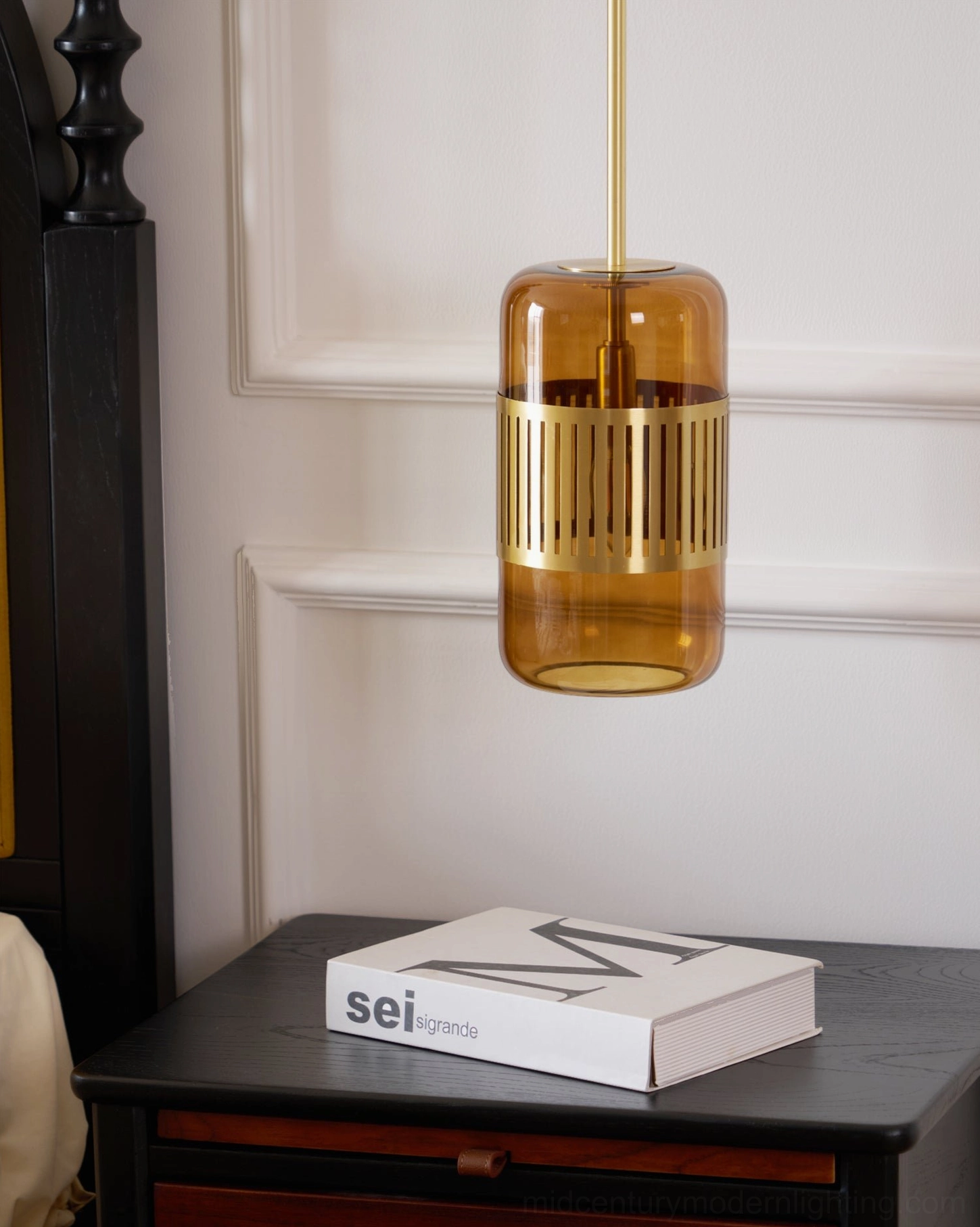 Lizak wall mounted lamp detail shot showing brass construction and glass shade mounting, clean contemporary design lines