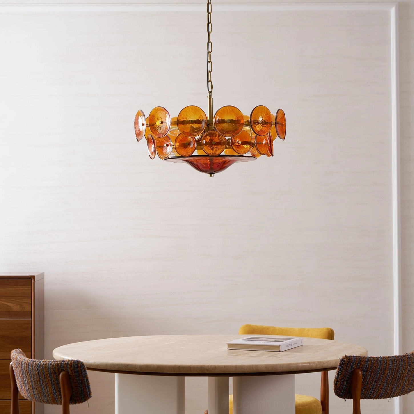 Lorenzo mid-century modern chandelier detail shot of bronze frame construction and glass disc mounting