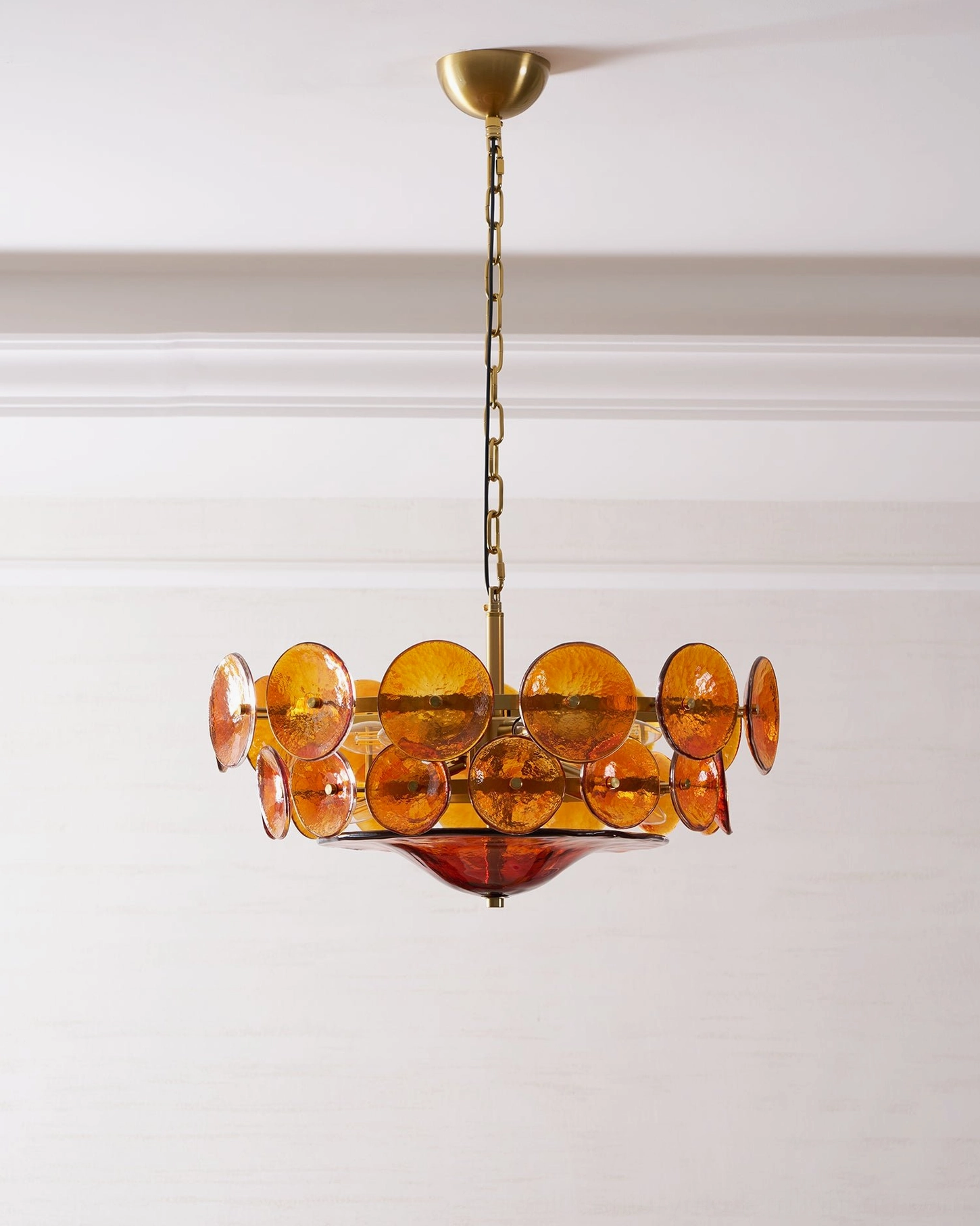 White soft Lorenzo mid-century modern chandelier in bright natural light contemporary home