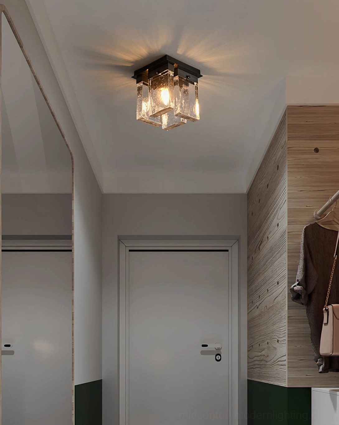 Multiple Lourmarin black ceiling lights installed throughout modern residential hallway for cohesive design