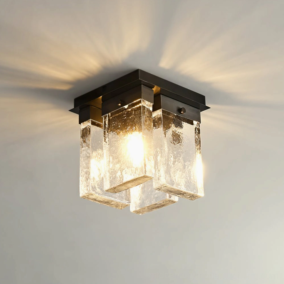 Black matte brass ceiling light showing warm ambient light diffusion through opaque glass panels