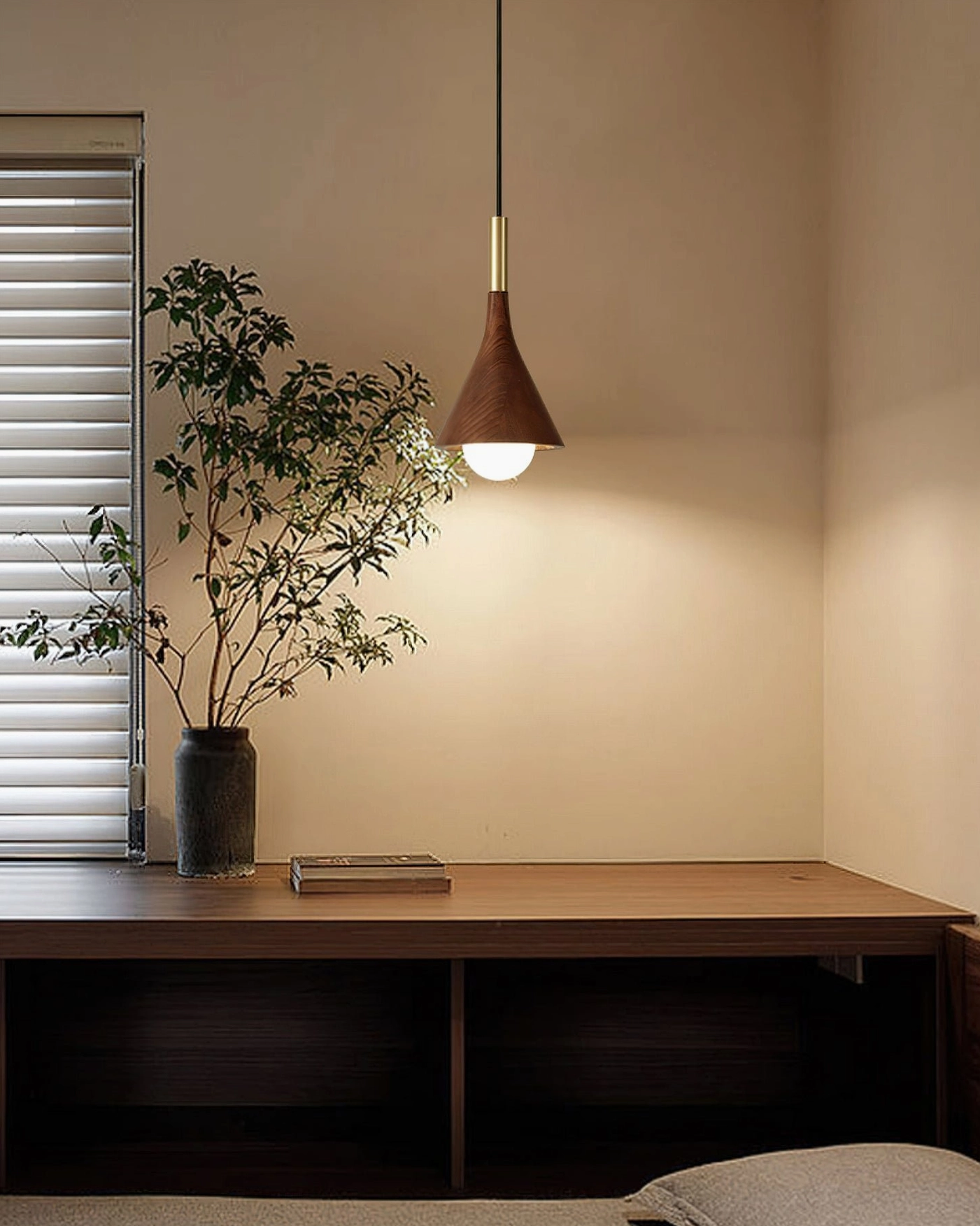 Lucian walnut pendant light in home office with wooden desk and natural light