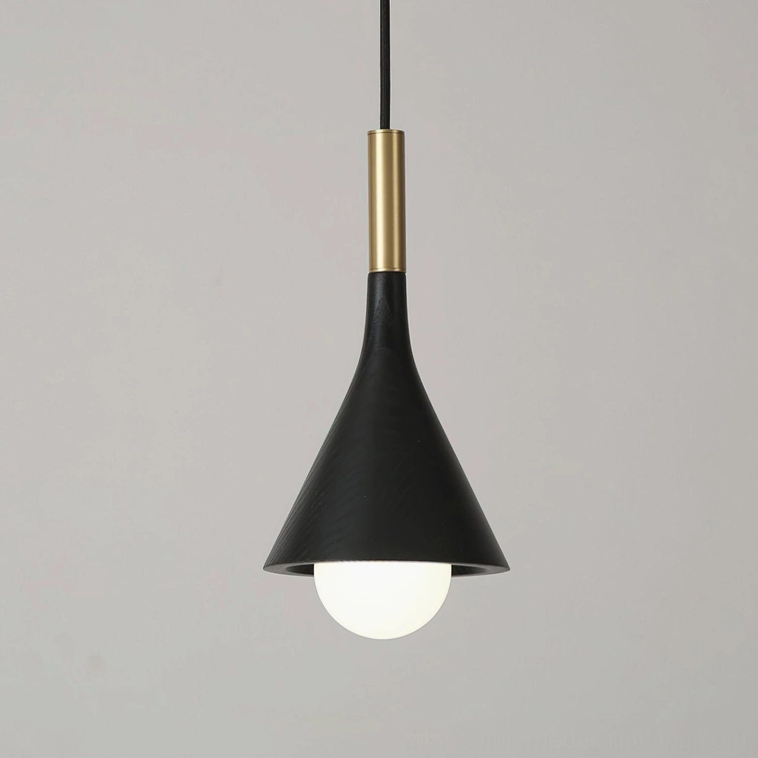 Lucian pendant light hanging at various heights showing wire adjustability