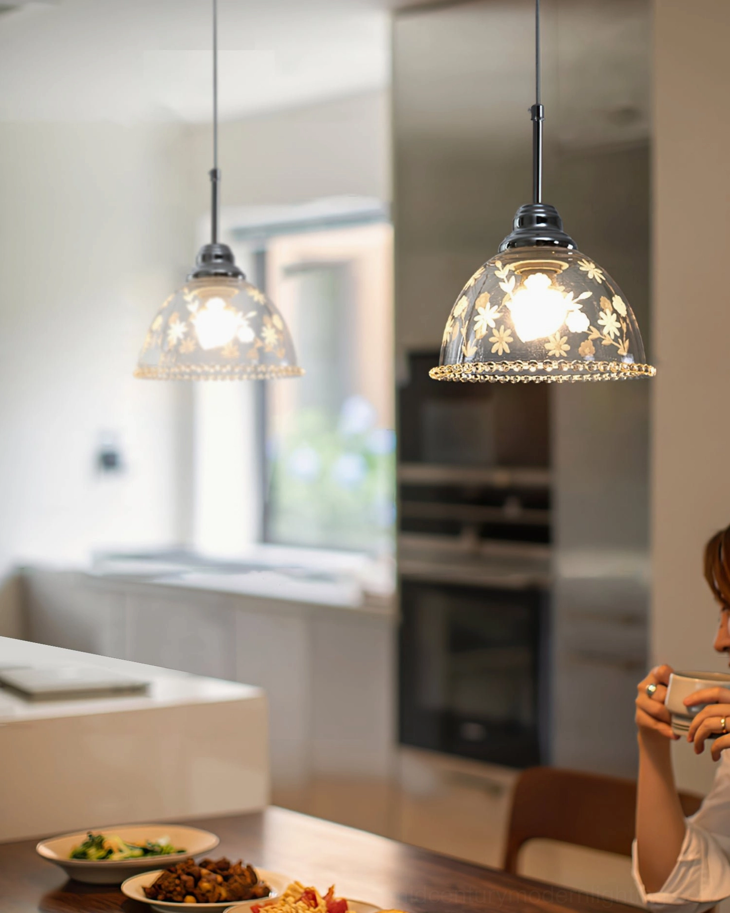 Dual Lucinda etched glass pendant lamps in farmhouse kitchen dining area, ambient lighting setup