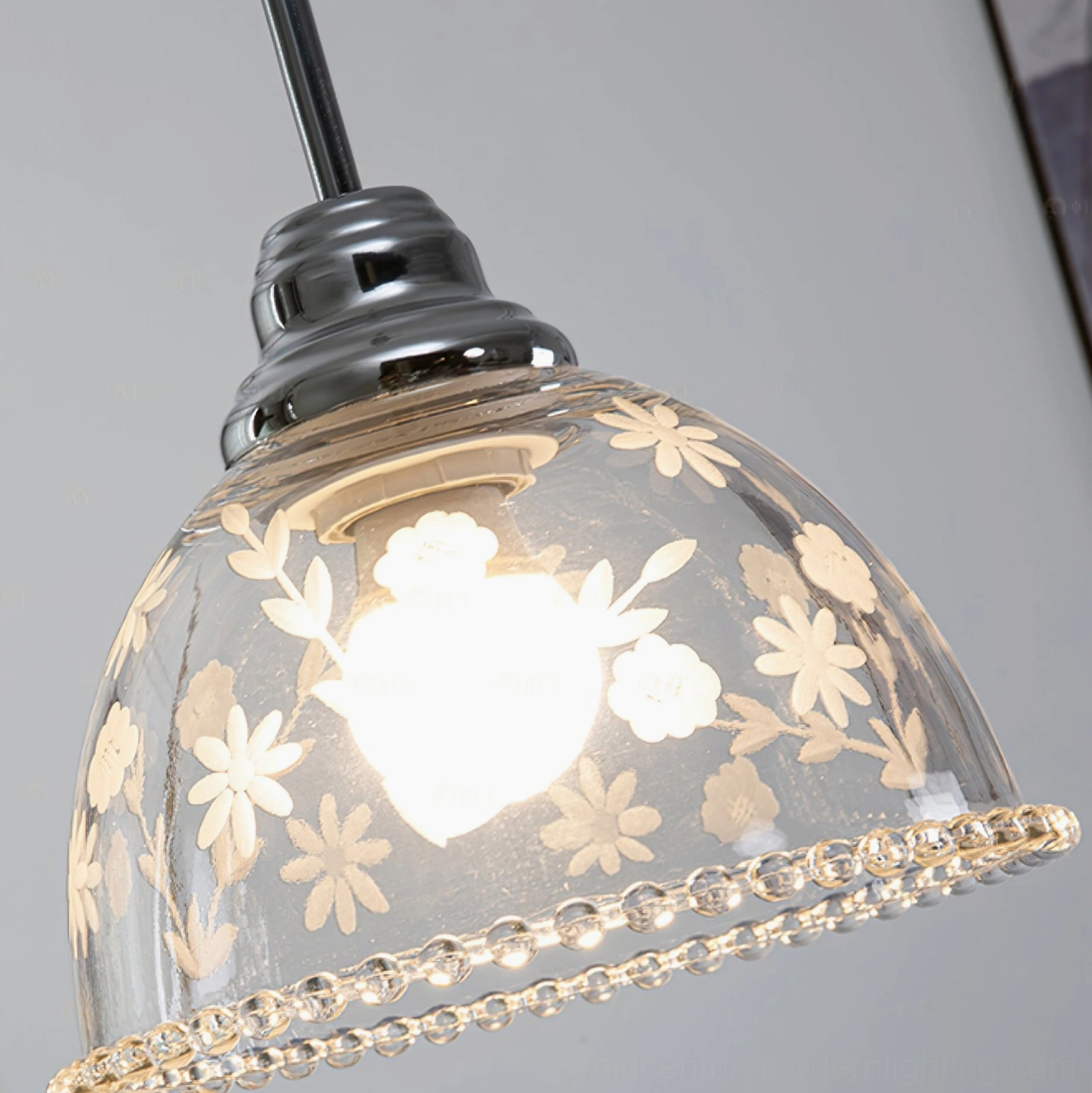 Lucinda etched glass pendant lamp close-up detail of floral engravings and chrome hardware