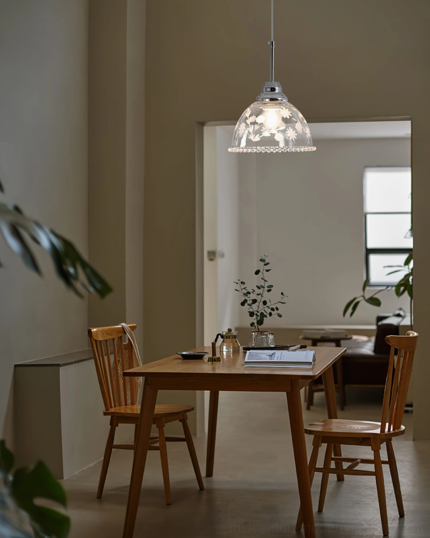 Lucinda etched glass pendant lamp in formal dining room with wooden furniture and warm farmhouse style