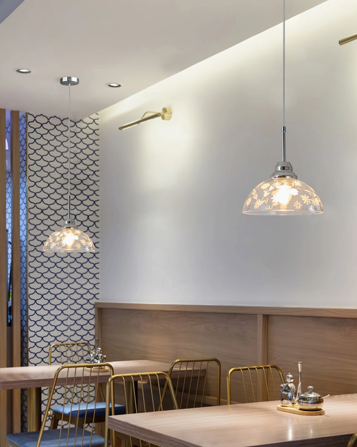 Multiple Lucinda pendant lamps in commercial cafe dining space creating warm vintage restaurant lighting