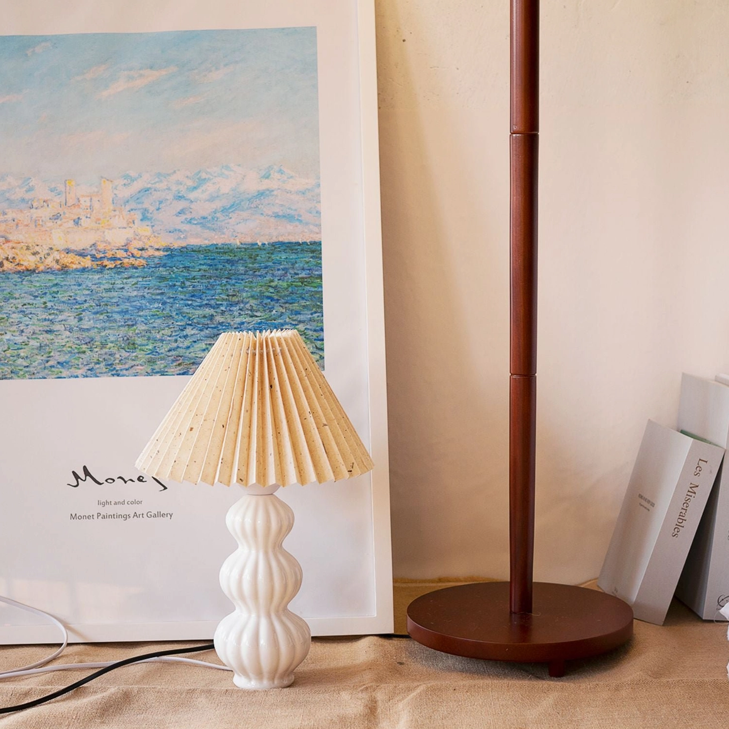 Luna pleated ceramic table lamp detail shot, curved ceramic base with pleated fabric shade construction