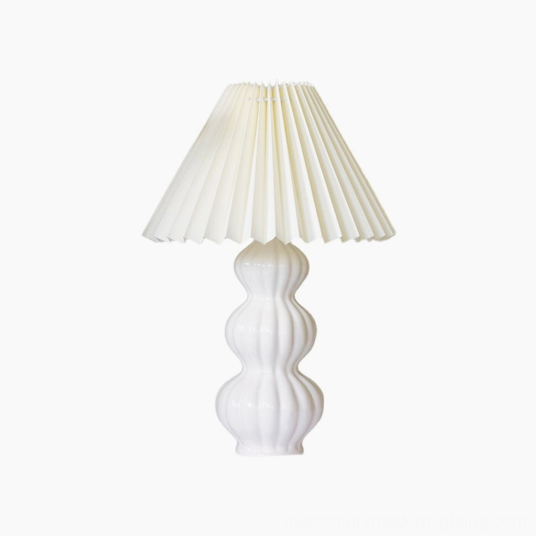 Luna pleated table lamp complete product view, white ceramic base with beige fabric shade assembly