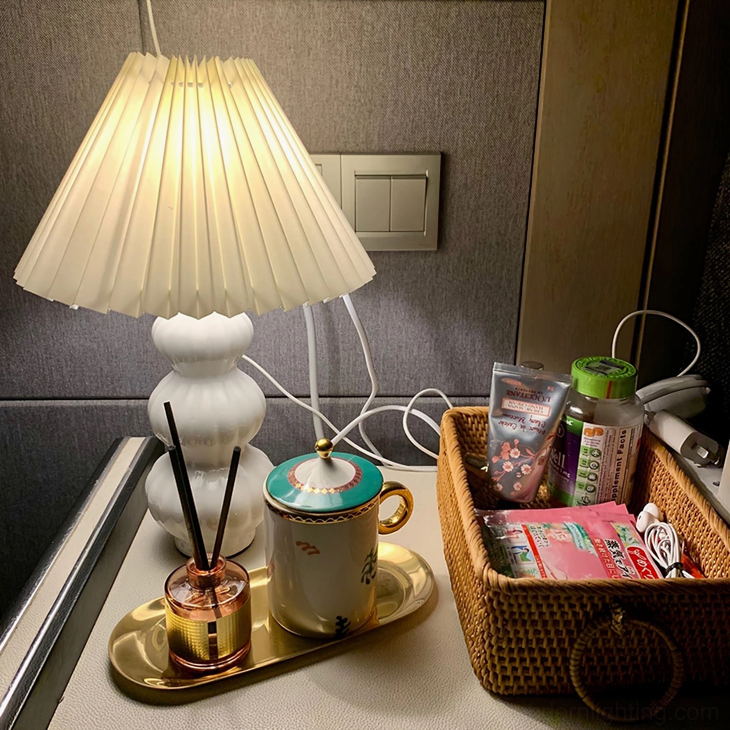 Luna pleated table lamp light diffusion demonstration, soft shadow-free illumination from pleated shade design