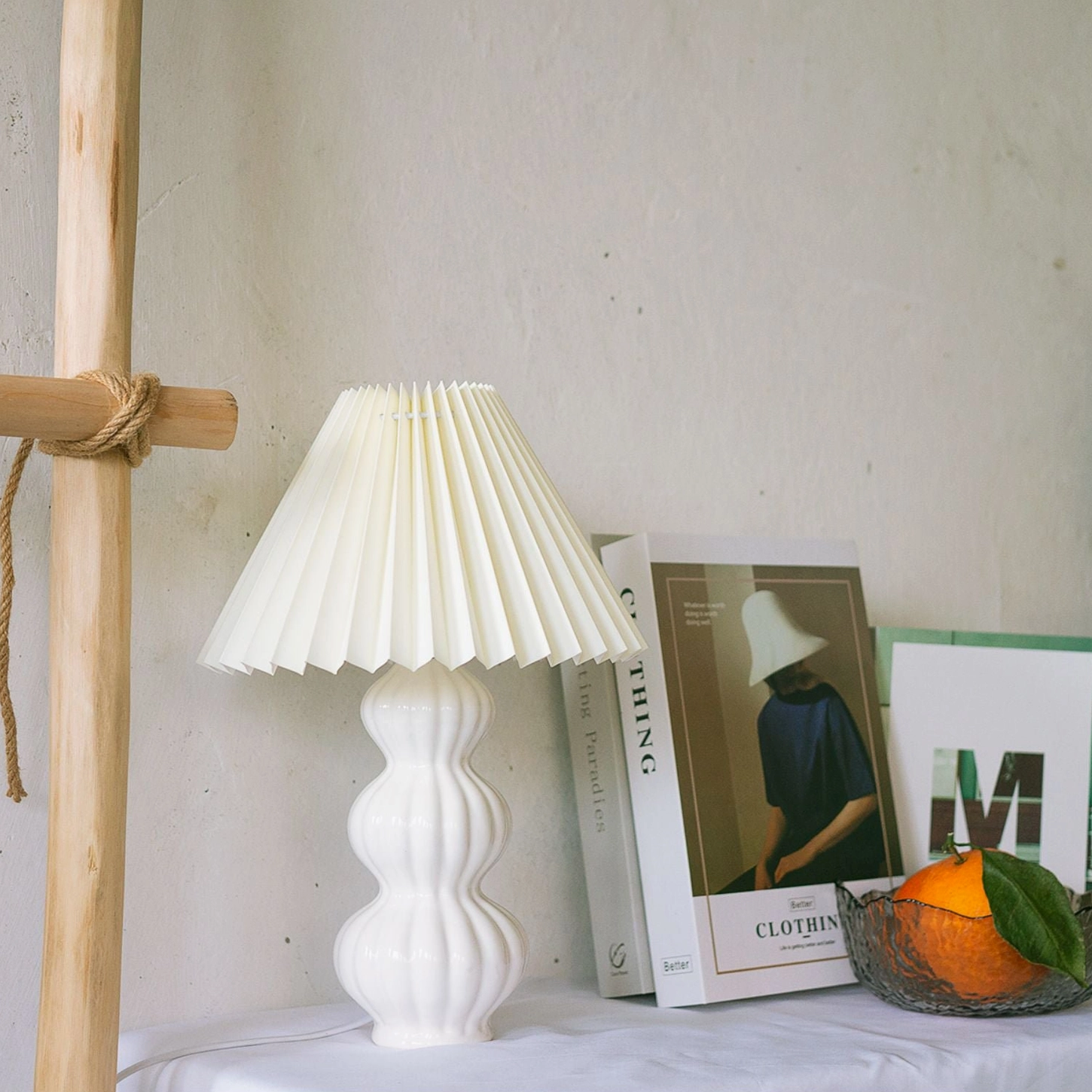 Luna pleated table lamp material composition, ceramic base and premium fabric shade construction details
