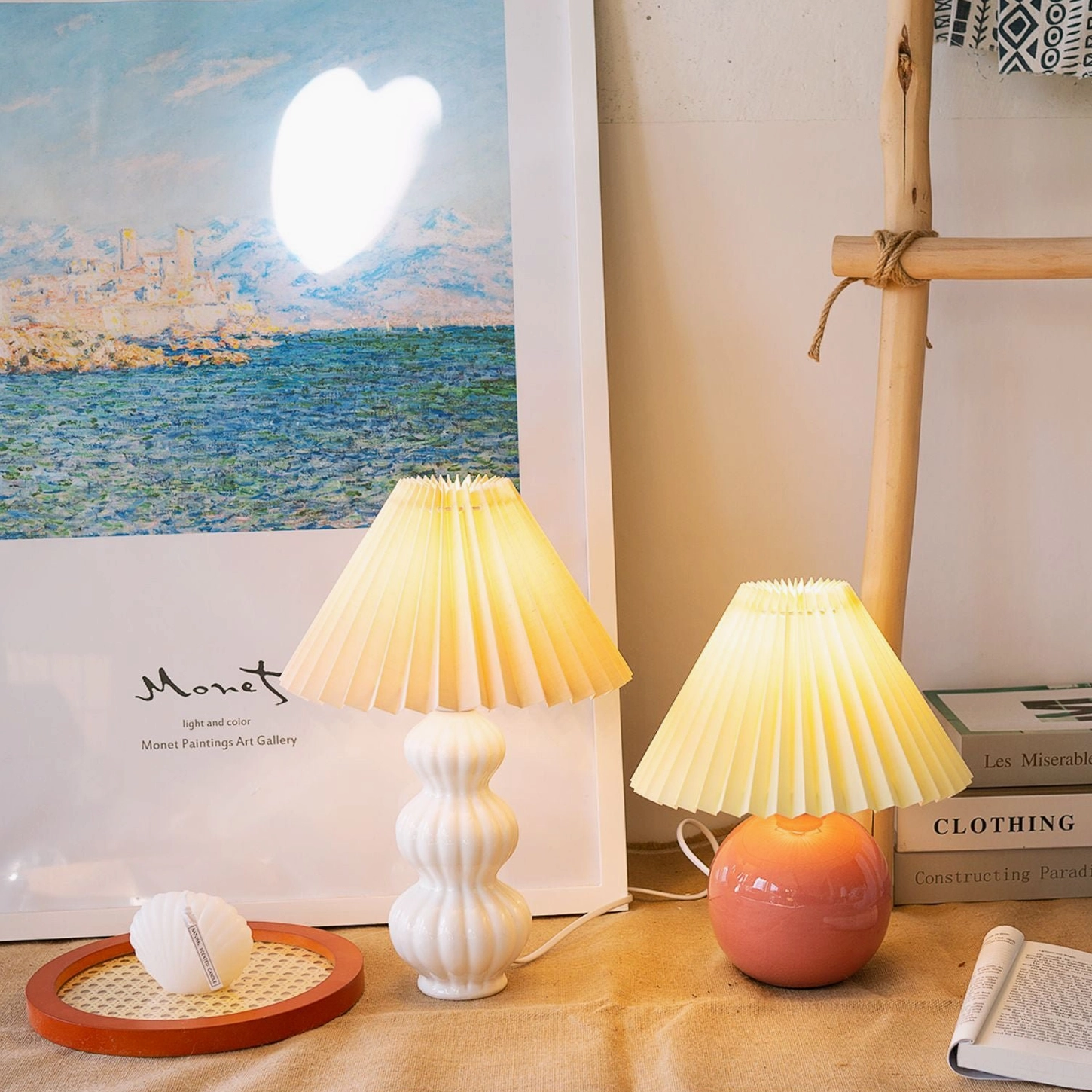 Luna pleated table lamp paired with terracotta accent lamp, white ceramic bases with warm beige and earth-tone shades