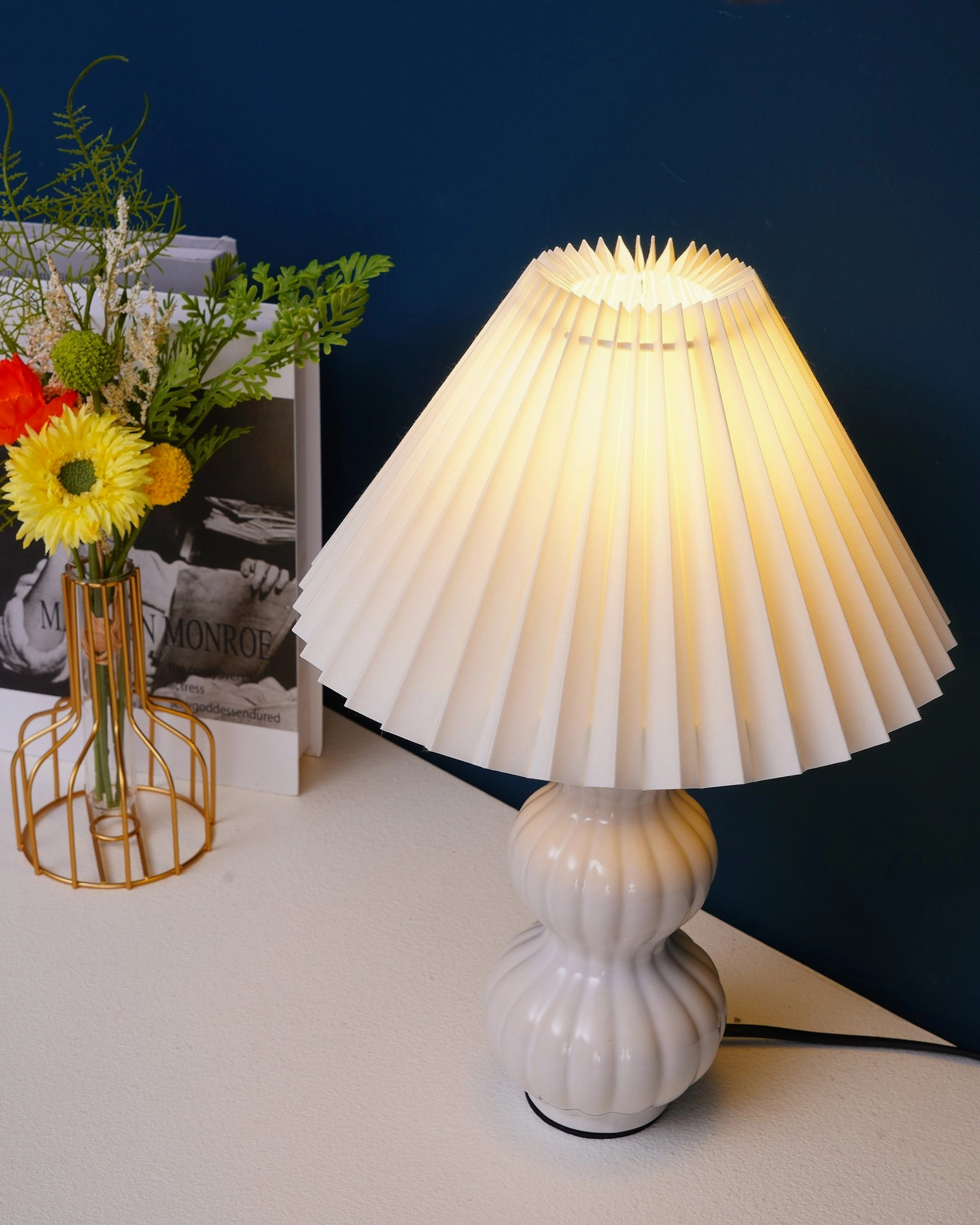 Luna pleated table lamp interior design showroom display, mid-century modern furniture collection styling