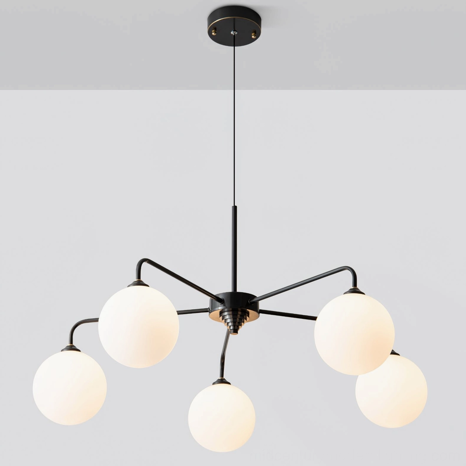 Below-view perspective of Lune chandelier illustrating globe arrangement and light diffusion from below