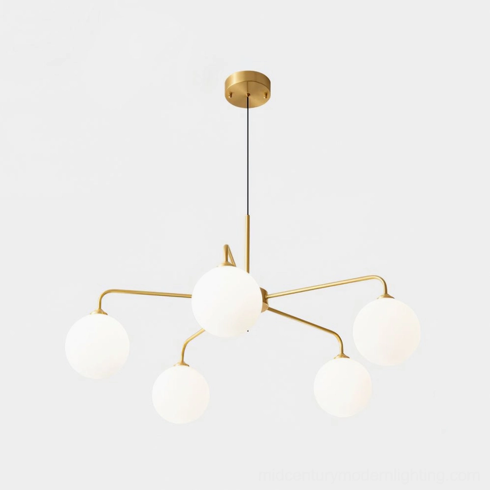 Gold and white Lune chandelier variant with frosted glass shades in refined luxury lighting application