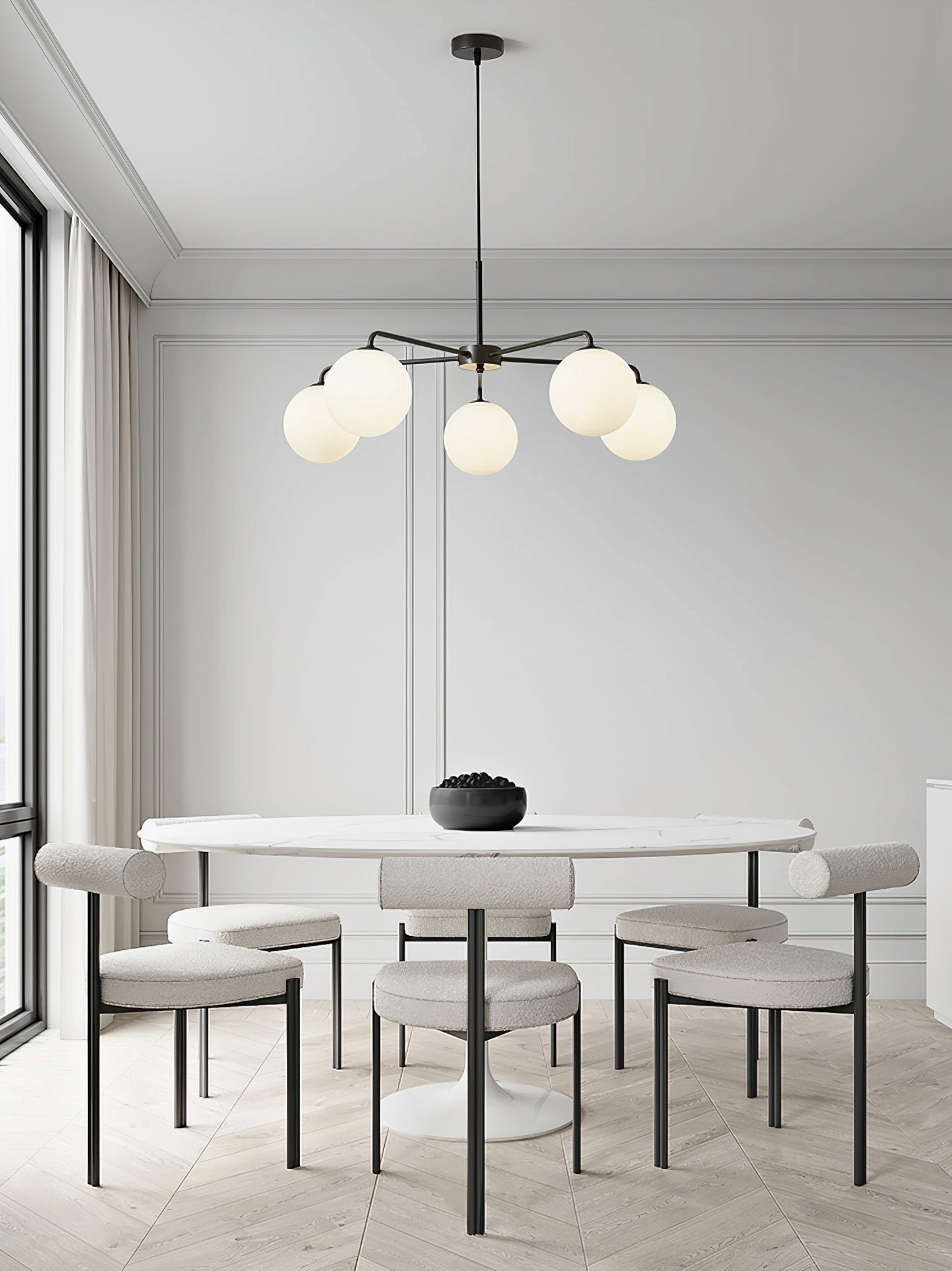 Lune chandelier installation view showing height and spatial presence in residential interior setting