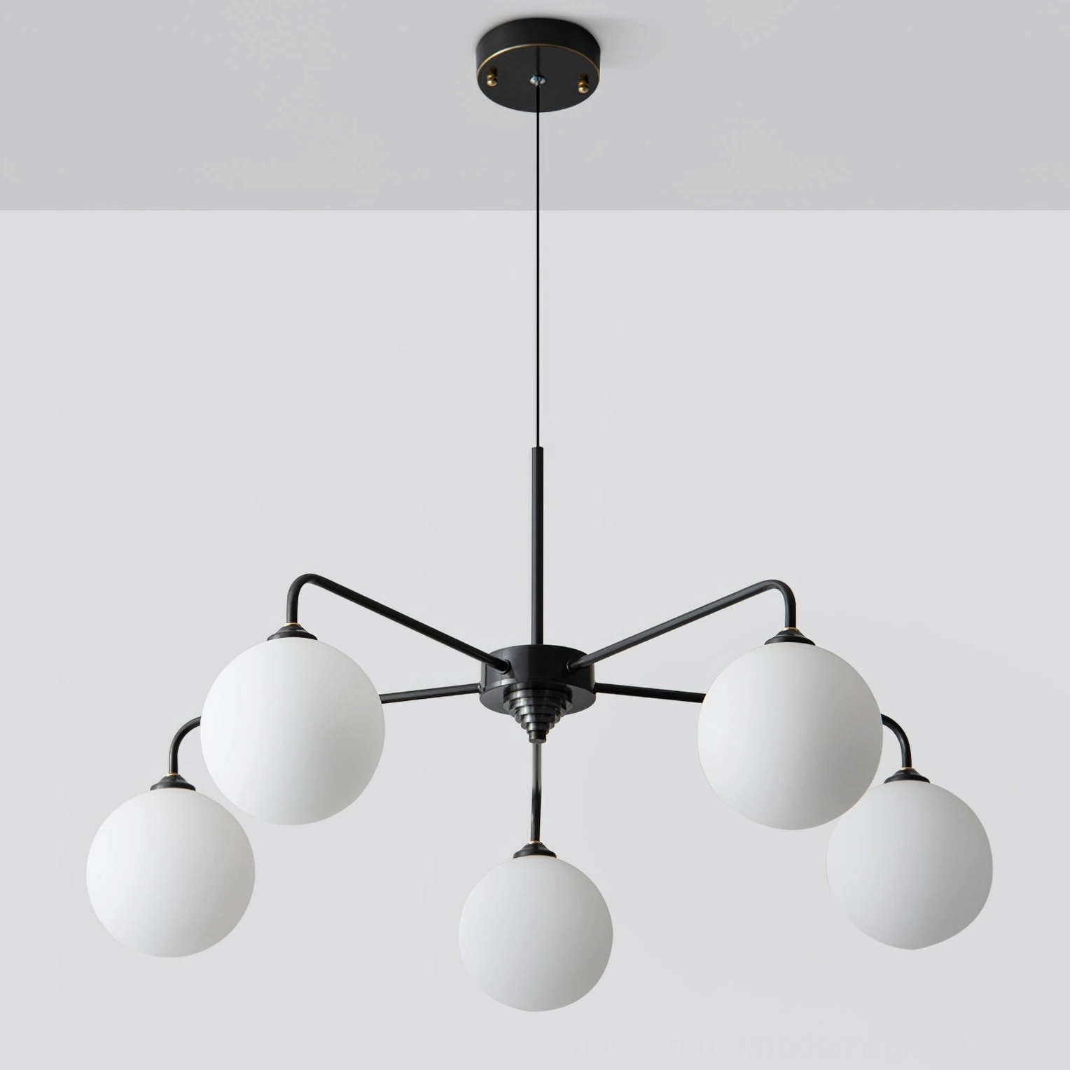 Three-quarter view of Lune glass sphere arrangement showing mid-century modern proportion and symmetry