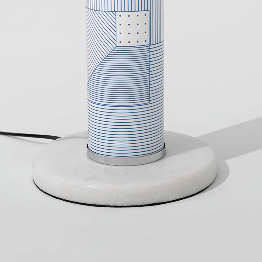 Premium marble base floor lamp with woven linen shade and contemporary printed pattern, product photography