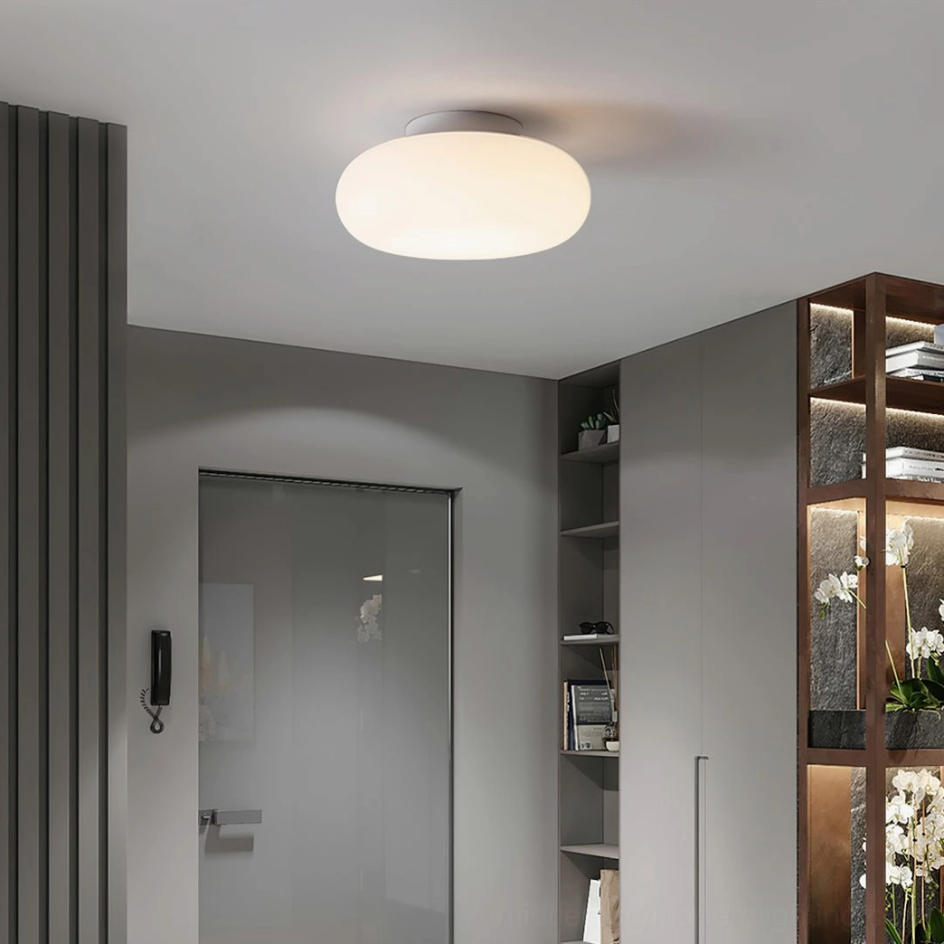 Maga ceiling light architectural detail showing slim chrome base and white PE ellipsoid shade