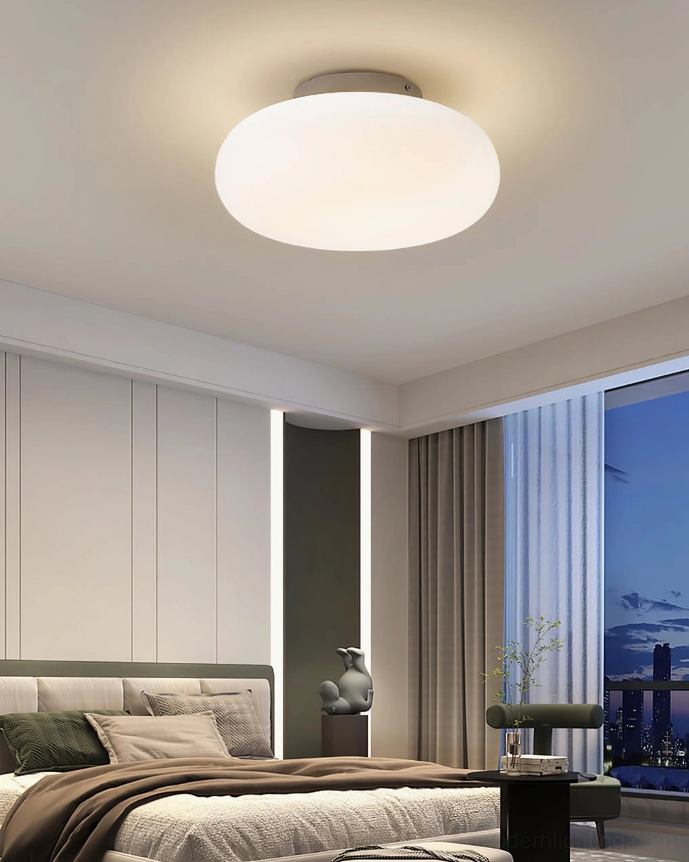 Maga ellipsoid ceiling light installation showing flush-mount design against white ceiling