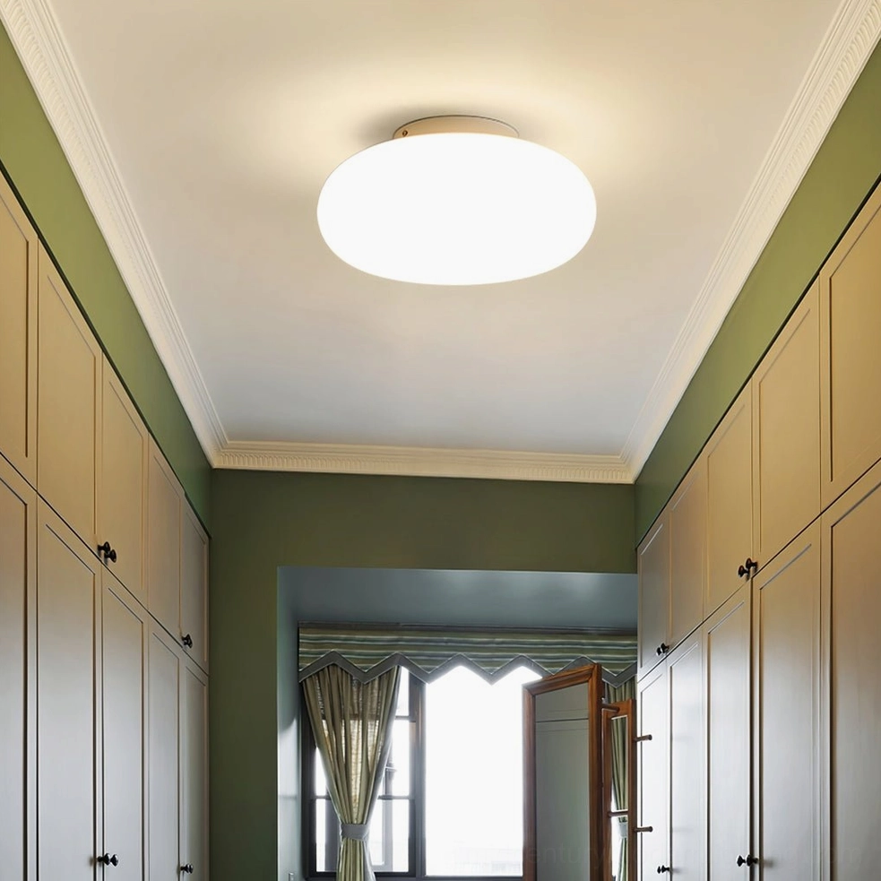 Maga ceiling light fixture in Japandi minimalist interior, soft warm illumination