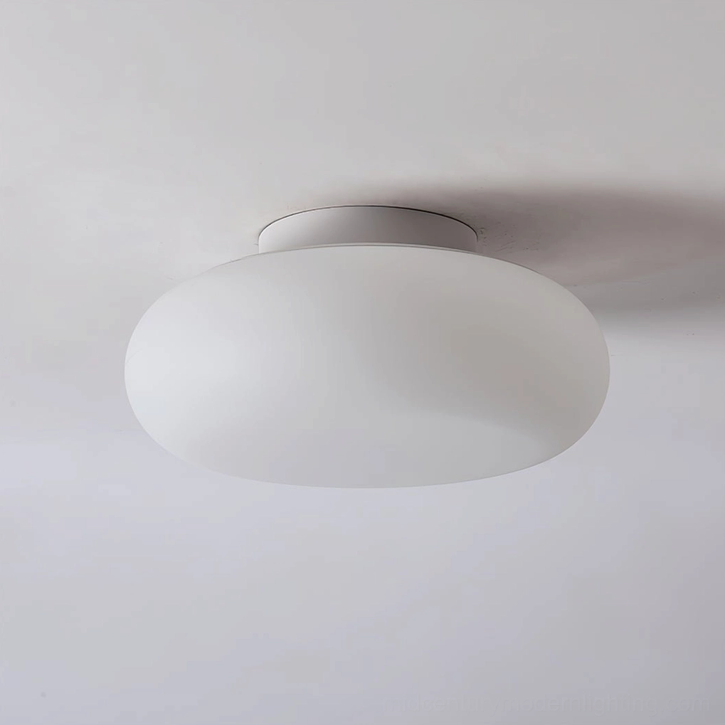 Maga ellipsoid ceiling fixture soft pebble-shaped silhouette minimalist modern lighting solution