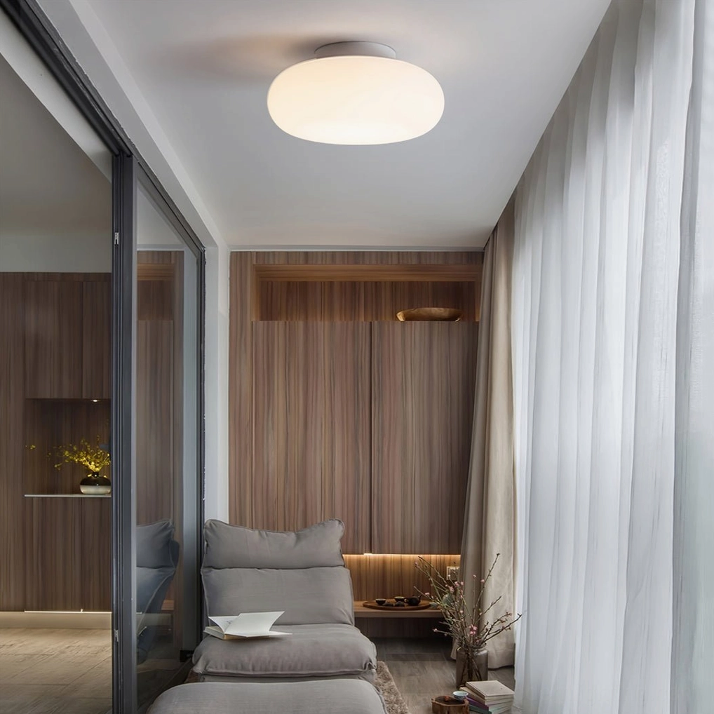 Maga ceiling light in Scandinavian interior design bedroom with wooden accents and soft furnishings