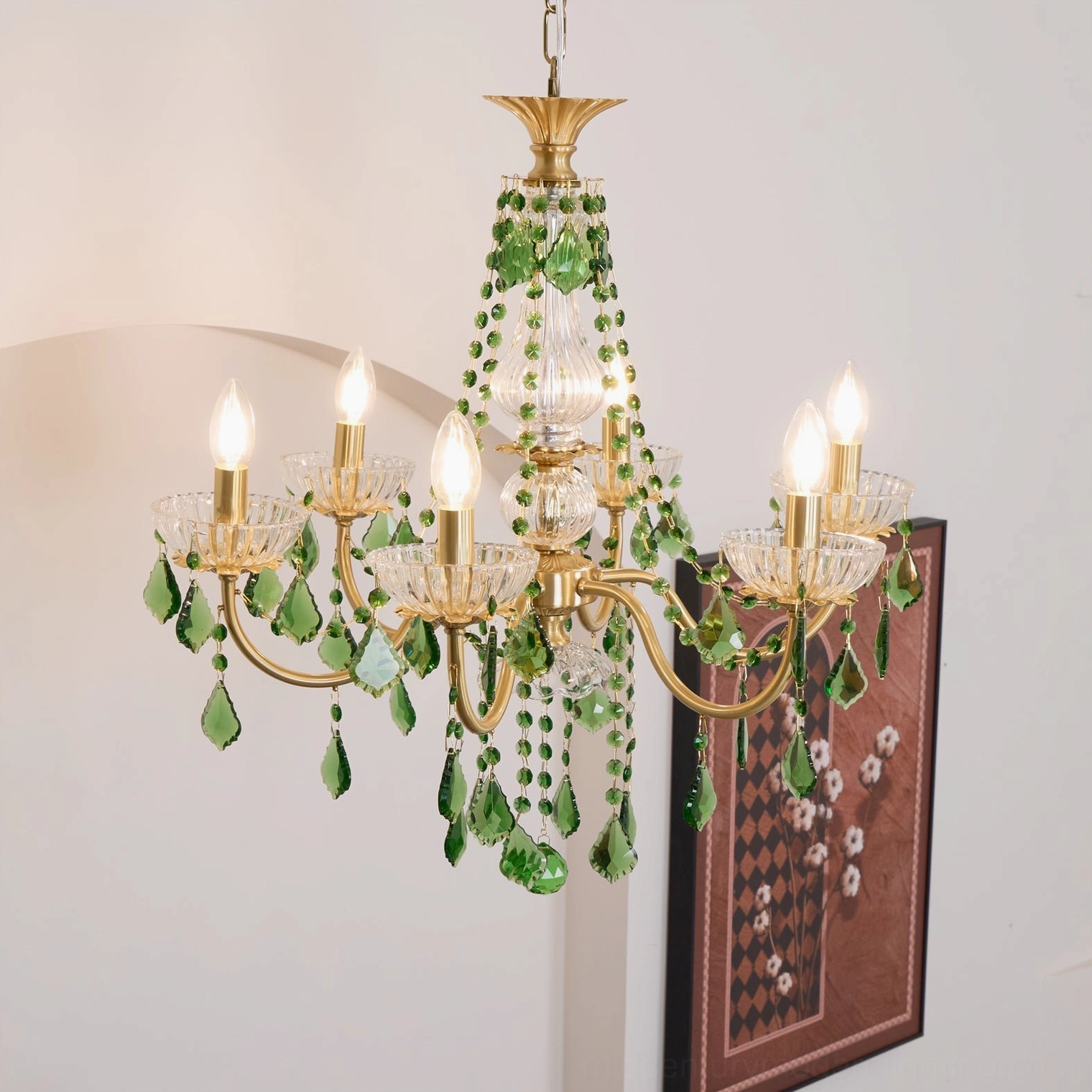 Elegant Magdalena brass chandelier in hallway setting with wall decor and neoclassical style