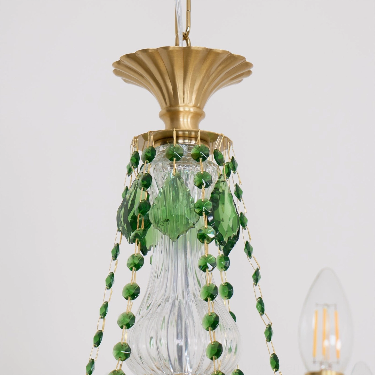 Magdalena brass chandelier intricate design with multiple crystal-laden arms and patina finish