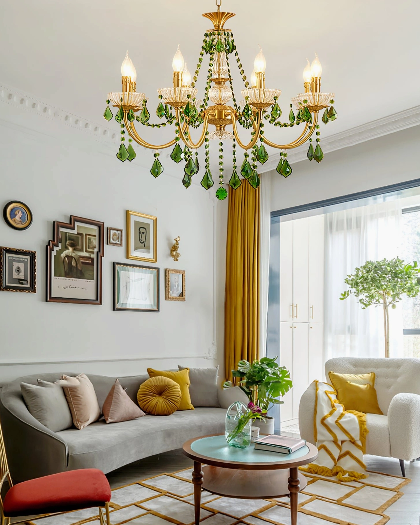 Magdalena chandelier detail showing brass cup holders and faceted green crystal pendants
