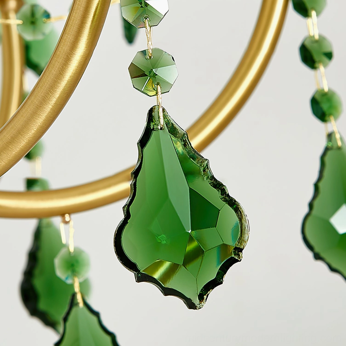 Close-up detail of Magdalena chandelier teardrop faceted green crystal beads