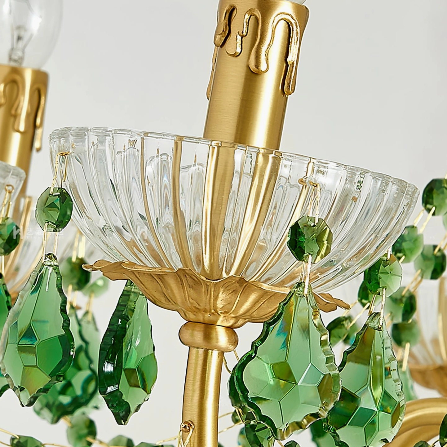 Magdalena chandelier lamp socket and drip-style brass base close-up detail