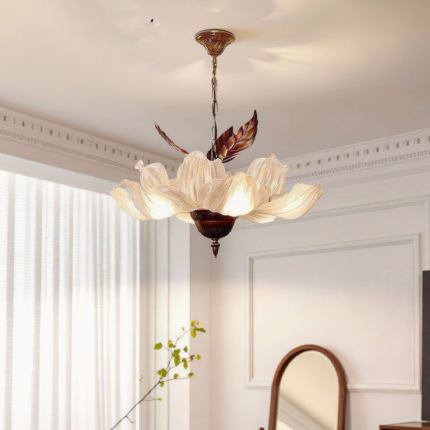 Magnolia Bloom Chandelier installed above round dining table showing proper proportions and light distribution