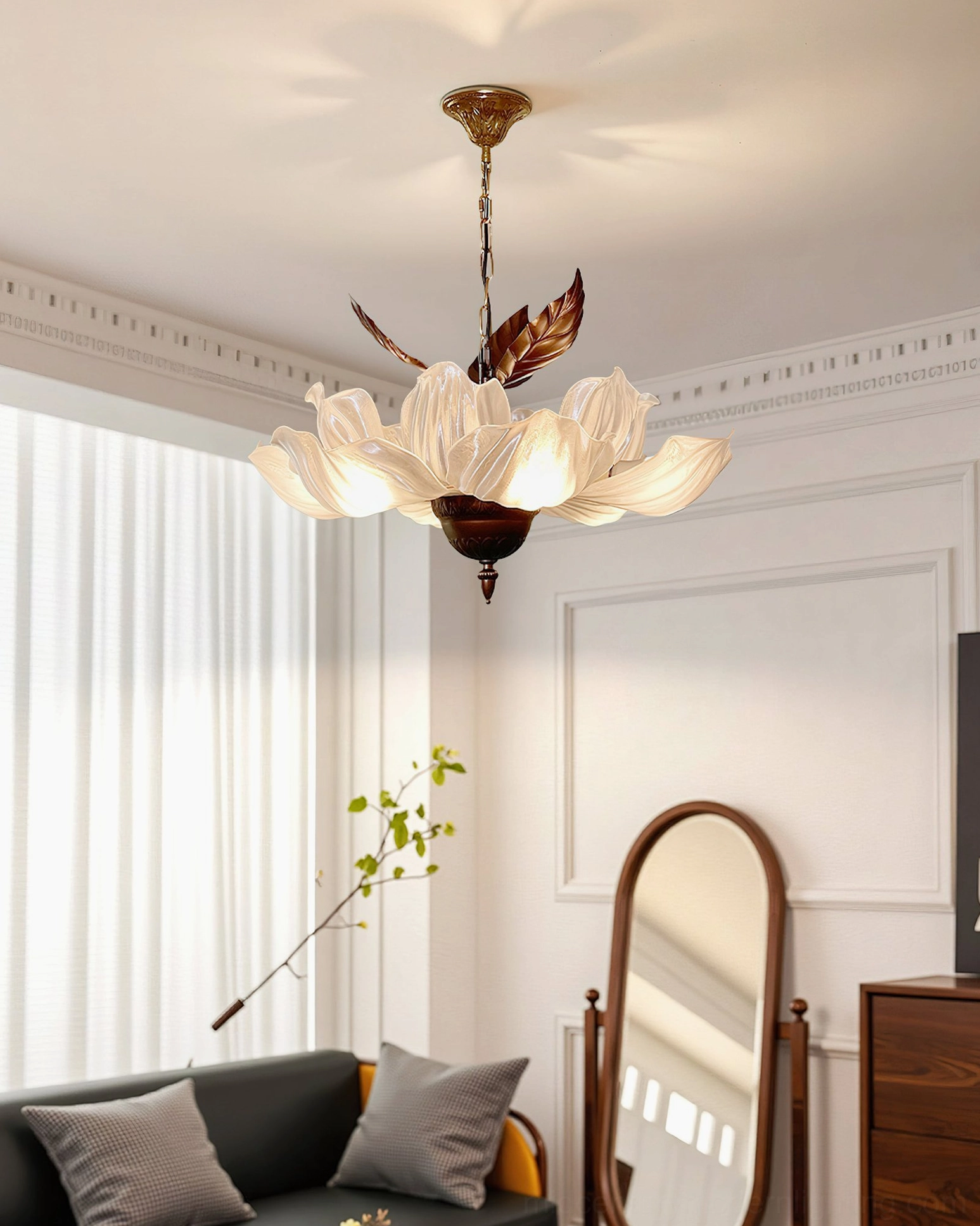 Magnolia Bloom Chandelier in compact retro living room with dark sofa and full-length mirror reflection