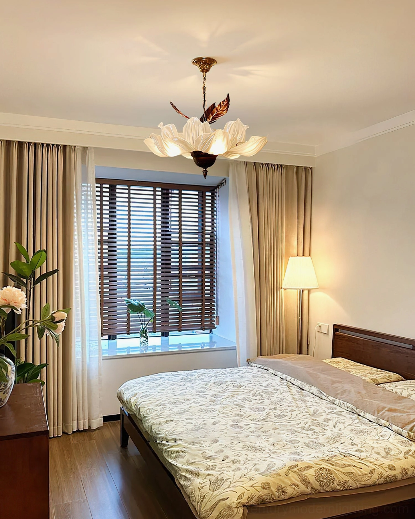 Magnolia Bloom Chandelier in minimalist vintage bedroom with neutral bedding and window blinds