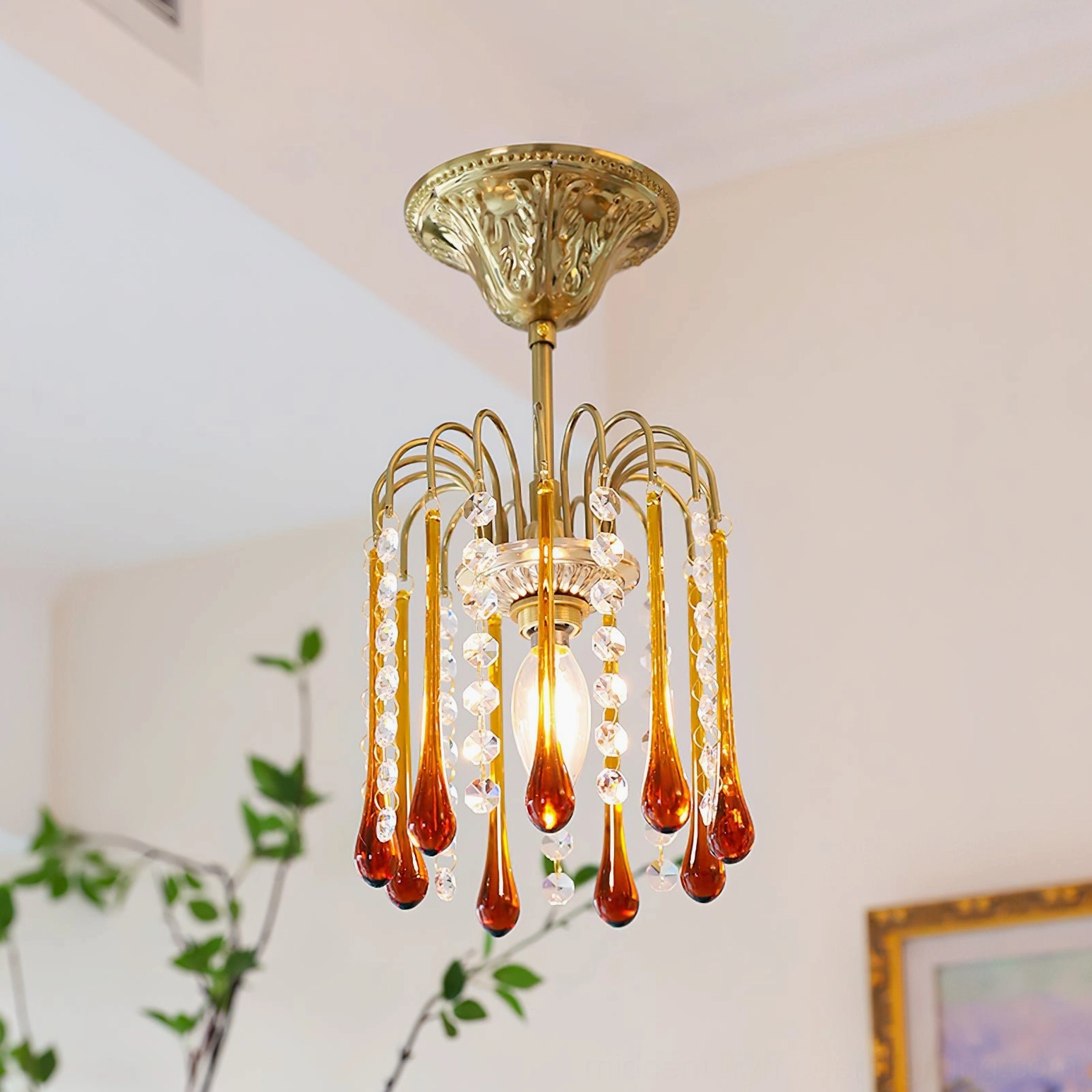 Three-quarter side view of Maltose vintage French ceiling light with brass hardware and crystal droplets, home decor setting