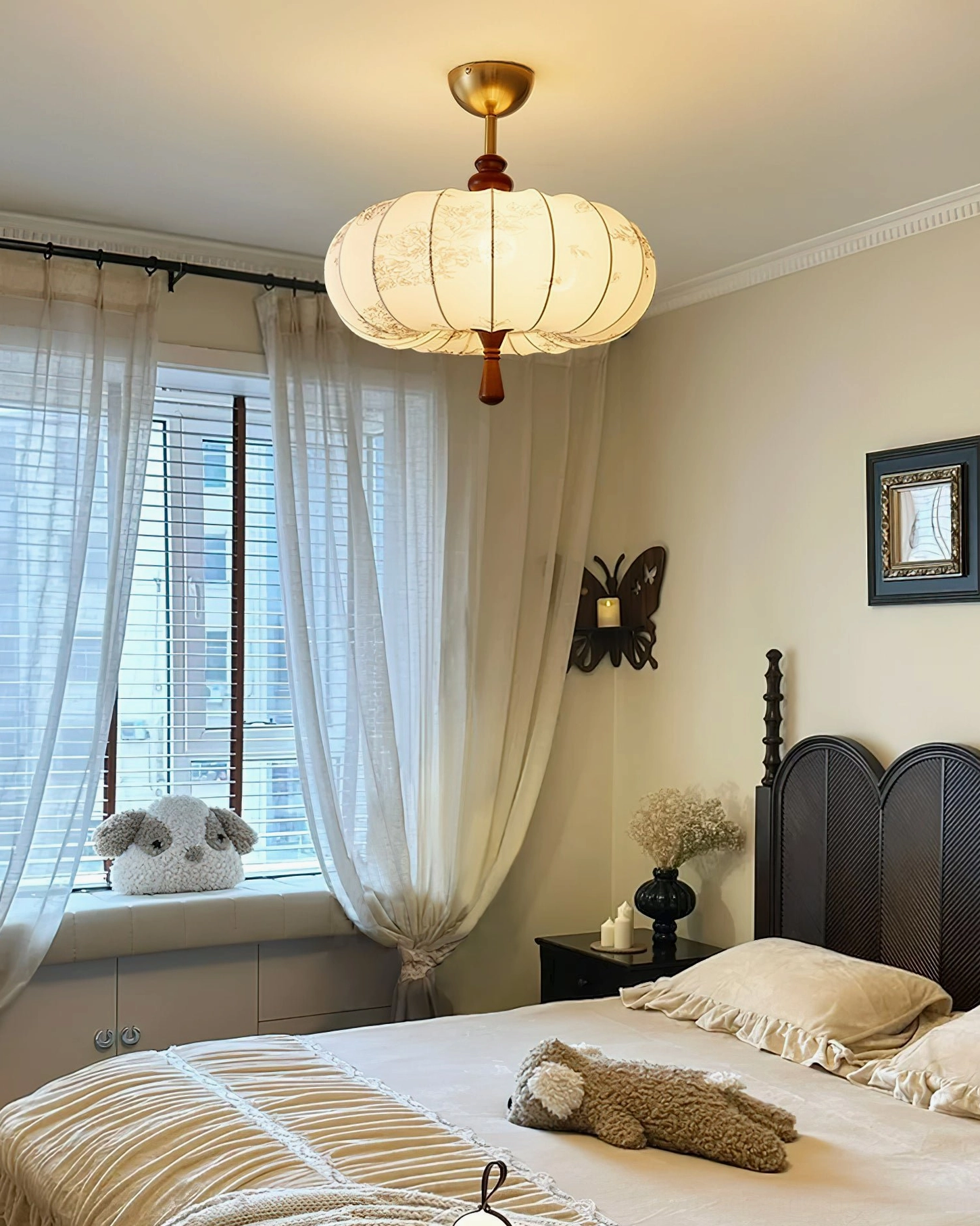 Master bedroom with bay window featuring Mantis lantern ceiling light in neutral warm interior design