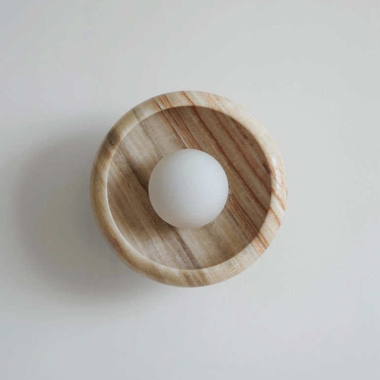 Marble wall lamp contemporary design minimalist aesthetic gallery-worthy